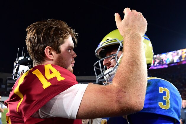 LOS ANGELES, CA - NOVEMBER 18:  Josh Rosen #3 of the UCLA Bruins and Sam Darnold #14 of the USC Trojans meet on the field after a 28-23 Trojan win at Los Angeles Memorial Coliseum on November 18, 2017 in Los Angeles, California.  (Photo by Harry How/Getty Images)