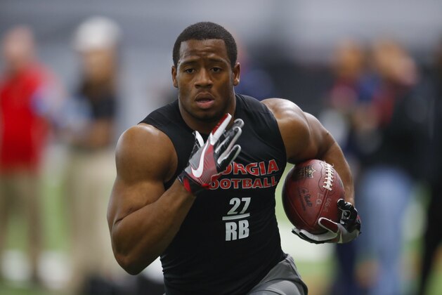 Georgia running back Nick Chubb participates in a drill during Georgia Pro Day, Wednesday, March 21, 2018, in Athens. Pro Day is intended to showcase talent to NFL scouts for the upcoming draft. (AP Photo/Todd Kirkland)