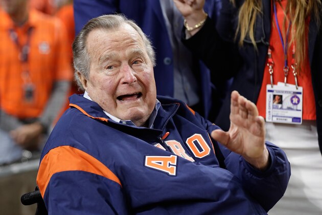 HOUSTON, TX - OCTOBER 29: Former United States President George H. W. Bush prepares to throw out the ceremonial first pitch before game five of the 2017 World Series between the Houston Astros and the Los Angeles Dodgers at Minute Maid Park on October 29, 2017 in Houston, Texas.  (Photo by David J. Phillip - Pool/Getty Images)