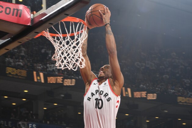 TORONTO, CANADA - APRIL 25: DeMar DeRozan #10 of the Toronto Raptors dunks the ball against the Washington Wizards in Game Five of the Eastern Conference Quarterfinals during the 2018 NBA Playoffs on April 25, 2018 at the Air Canada Centre in Toronto, Ontario, Canada. NOTE TO USER: User expressly acknowledges and agrees that, by downloading and/or using this photograph, user is consenting to the terms and conditions of the Getty Images License Agreement. Mandatory Copyright Notice: Copyright 2018 NBAE (Photo by Ron Turenne/NBAE via Getty Images)
