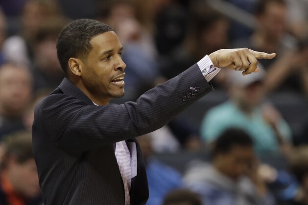 Charlotte Hornets associate head coach Stephen Silas directs his team against the Utah Jazz during the first half of an NBA basketball game in Charlotte, N.C., Friday, Jan. 12, 2018. (AP Photo/Chuck Burton)