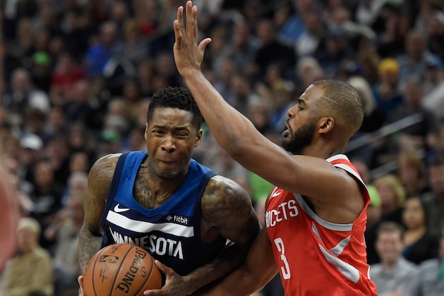 MINNEAPOLIS, MN - APRIL 21: Chris Paul #3 of the Houston Rockets fouls Jamal Crawford #11 of the Minnesota Timberwolves during the fourth quarter in Game Three of Round One of the 2018 NBA Playoffs on April 21, 2018 at the Target Center in Minneapolis, Minnesota. The Timberwolves defeated 121-105. NOTE TO USER: User expressly acknowledges and agrees that, by downloading and or using this Photograph, user is consenting to the terms and conditions of the Getty Images License Agreement. (Photo by Hannah Foslien/Getty Images)