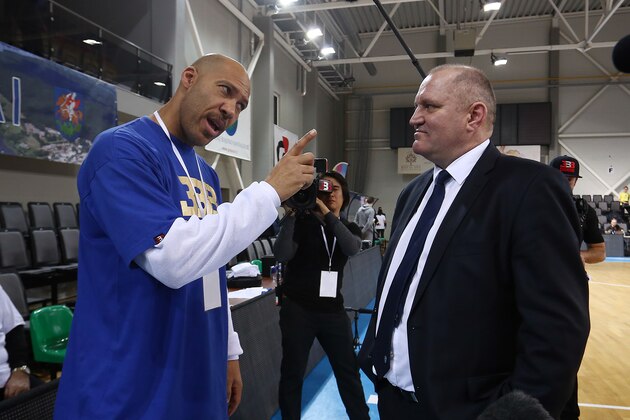 PRIENAI, LITHUANIA - JANUARY 09:  LaVar Ball father of LiAngelo and LaMelo Ball talks with Virginijus Seskus head coach of Vytautas Prienai during the match between Vytautas Prienai and Zalgiris Kauno on January 9, 2018 in Prienai, Lithuania.  (Photo by Alius Koroliovas/Getty Images)