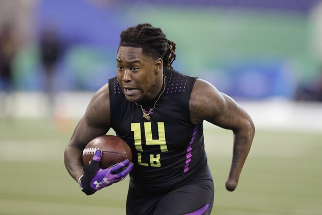 Central Florida linebacker Shaquem Griffin runs a drill during the NFL football scouting combine, Sunday, March 4, 2018, in Indianapolis. (AP Photo/Darron Cummings)