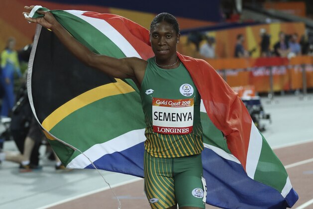 South Africa's Caster Semenya celebrates winning gold in the woman's 800m final at Carrara Stadium during the Commonwealth Games on the Gold Coast, Australia, Friday, April 13, 2018. (AP Photo/Dita Alangkara)