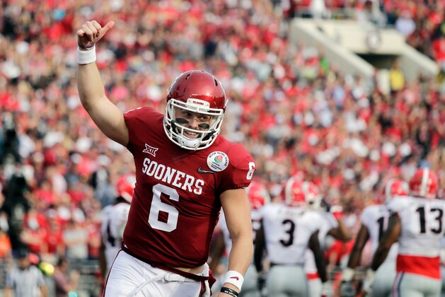 FILE - In this Jan. 1, 2018, file photo, Oklahoma quarterback Baker Mayfield celebrates after running back Rodney Anderson scored a touchdown against Georgia during the first half of the Rose Bowl NCAA college football game in Pasadena, Calif. Mayfield is expected to be a first round pick in the NFL Draft.(AP Photo/Jae C. Hong, File)