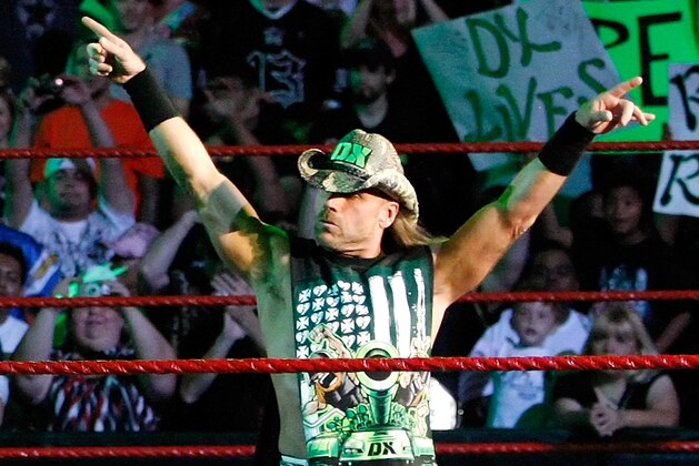 LAS VEGAS - AUGUST 24:  Wrestlers and tag team partners Triple H (L) and Shawn Michaels pose during the WWE Monday Night Raw show at the Thomas & Mack Center August 24, 2009 in Las Vegas, Nevada.  (Photo by Ethan Miller/Getty Images)