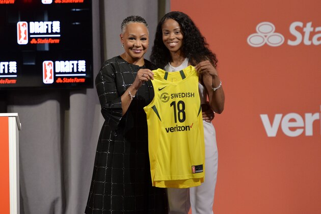 NEW YORK, NY - APRIL 12: Jordin Canada stands with WNBA President Lisa Borders after being selected #5 by the Seattle Storm during the WNBA Draft 2018 on April 12, 2018 at Nike New York Headquarters in New York, New York. NOTE TO USER: User expressly acknowledges and agrees that, by downloading and or using this Photograph, user is consenting to the terms and conditions of the Getty Images License Agreement. Mandatory Copyright Notice: Copyright 2018 NBAE (Photo by David Dow/NBAE via Getty Images) NEW YORK, NY - APRIL 12: Jordin Canada stands with WNBA President Lisa Borders after being selected #5 by the Seattle Storm during the WNBA Draft 2018 on April 12, 2018 at Nike New York Headquarters in New York, New York. NOTE TO USER: User expressly acknowledges and agrees that, by downloading and or using this Photograph, user is consenting to the terms and conditions of the Getty Images License Agreement. Mandatory Copyright Notice: Copyright 2018 NBAE (Photo by David Dow/NBAE via Getty Images)