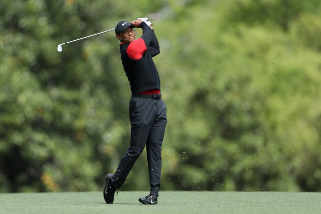 AUGUSTA, GA - APRIL 08:  Tiger Woods of the United States plays his second shot on the fifth hole during the final round of the 2018 Masters Tournament at Augusta National Golf Club on April 8, 2018 in Augusta, Georgia.  (Photo by David Cannon/Getty Images)