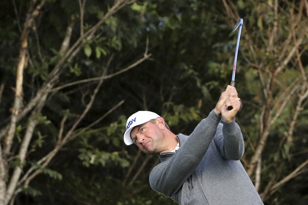 FILE - In this Friday, Oct. 20, 2017, file photo, Lucas Glover, of the United States, watches his shot on the eighth hole during the second round of the CJ Cup golf tournament at Nine Bridges on Jeju Island, South Korea. Pat Perez and Lucas Glover are among 17 players to show up at all three PGA Tour events on the Asian swing.  (Ko Bum Joon/Newsis via AP, File)