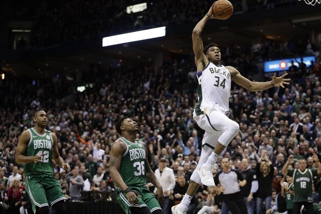 Milwaukee Bucks' Giannis Antetokounmpo dunks during the first half of Game 6 of an NBA basketball first-round playoff series against the Boston Celtics Thursday, April 26, 2018, in Milwaukee. (AP Photo/Morry Gash)