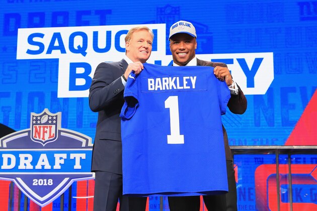 ARLINGTON, TX - APRIL 26:  Saquon Barkley of Penn State poses with NFL Commissioner Roger Goodell after being picked #2 overall by the New York Giants during the first round of the 2018 NFL Draft at AT&T Stadium on April 26, 2018 in Arlington, Texas.  (Photo by Tom Pennington/Getty Images)