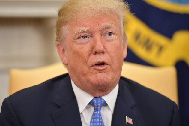 US President Donald Trump meets with German Chancellor Angela Merkel in the Oval Office of the White House on April 27, 2018 in Washington,DC. (Photo by MANDEL NGAN / AFP)        (Photo credit should read MANDEL NGAN/AFP/Getty Images)