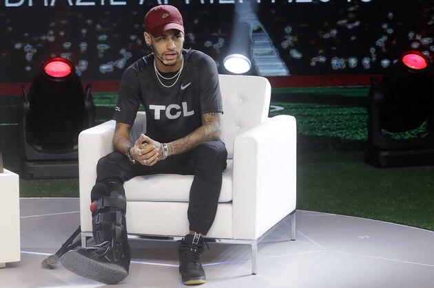 Brazil's soccer star Neymar speaks during a promotional event from one of his sponsors, in Sao Paulo, Brazil, Tuesday, April 17, 2018. The Paris Saint-Germain striker had been found to have suffered a sprain of the right ankle and fissure of the fifth metatarsal after a tangle with Marseille player, Bouna Sarr during a Feb. 25 match. (AP Photo/Andre Penner)