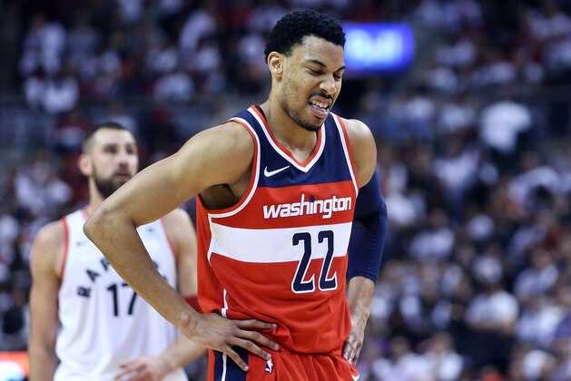 TORONTO, ON - APRIL 25:  Otto Porter Jr. #22 of the Washington Wizards reacts during the second half of Game Five against the Toronto Raptors in Round One of the 2018 NBA playoffs at Air Canada Centre on April 25, 2018 in Toronto, Canada.  NOTE TO USER: User expressly acknowledges and agrees that, by downloading and or using this photograph, User is consenting to the terms and conditions of the Getty Images License Agreement.  (Photo by Vaughn Ridley/Getty Images)'n