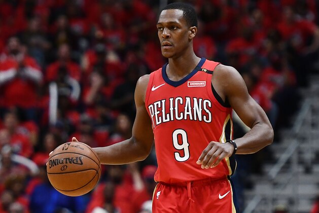 NEW ORLEANS, LA - APRIL 21:  Rajon Rondo #9 of the New Orleans Pelicans handles the ball against the Portland Trail Blazers during Game Four of the first round of the Western Conference playoffs at the Smoothie King Center on April 21, 2018 in New Orleans, Louisiana.  The Pelicans defeated the Trail Blazers 131-123 to sweep the series 4-0.  NOTE TO USER: User expressly acknowledges and agrees that, by downloading and or using this photograph, User is consenting to the terms and conditions of the Getty Images License Agreement.  (Photo by Stacy Revere/Getty Images)