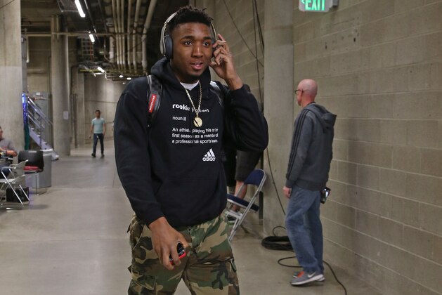 SALT LAKE CITY, UT - APRIL 10: Donovan Mitchell #45 of the Utah Jazz arrives to the arena before the game against the Golden State Warriors on April 10, 2018 at vivint.SmartHome Arena in Salt Lake City, Utah. NOTE TO USER: User expressly acknowledges and agrees that, by downloading and or using this Photograph, User is consenting to the terms and conditions of the Getty Images License Agreement. Mandatory Copyright Notice: Copyright 2018 NBAE (Photo by Melissa Majchrzak/NBAE via Getty Images)