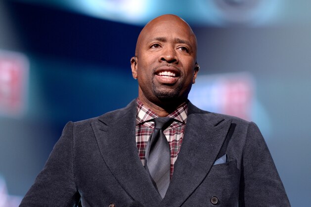 NEW YORK, NY - FEBRUARY 12:  Basketball player Kenny Smith speaks onstage as Fall Out Boy takes the stage at American Express All-Star Live at Hammerstein Ballroom broadcast live on TNT to tip-off NBA All-Star 2015 on February 12, 2015 in New York City.  (Photo by Stephen Lovekin/Getty Images for American Express)