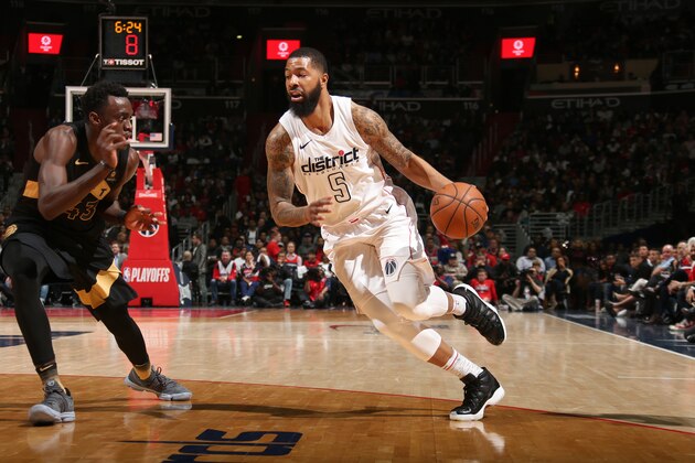 WASHINGTON, DC - APRIL 27: Markieff Morris #5 of the Washington Wizards handles the ball against the Toronto Raptors in Game Six of the Eastern Conference Quarterfinals during the 2018 NBA Playoffs on April 27, 2018 at the Capital One Arena in Washington, DC. NOTE TO USER: User expressly acknowledges and agrees that, by downloading and/or using this photograph, user is consenting to the terms and conditions of the Getty Images License Agreement. Mandatory Copyright Notice: Copyright 2018 NBAE (Photo by Ned Dishman/NBAE via Getty Images)