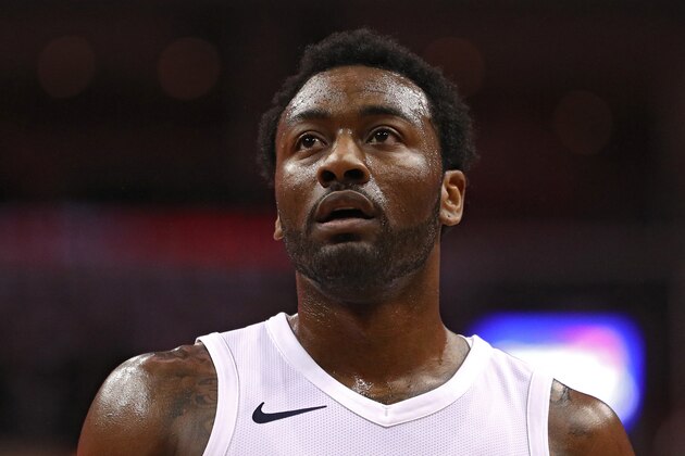 WASHINGTON, DC - APRIL 27: John Wall #2 of the Washington Wizards looks on against the Toronto Raptors in the first half during Game Six of Round One of the 2018 NBA Playoffs at Capital One Arena on April 27, 2018 in Washington, DC. NOTE TO USER: User expressly acknowledges and agrees that, by downloading and or using this photograph, User is consenting to the terms and conditions of the Getty Images License Agreement. (Photo by Patrick Smith/Getty Images)