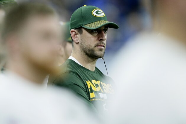 Green Bay Packers quarterback Aaron Rodgers watches from the sideline during the second half of an NFL football game against the Detroit Lions, Sunday, Dec. 31, 2017, in Detroit. (AP Photo/Duane Burleson)