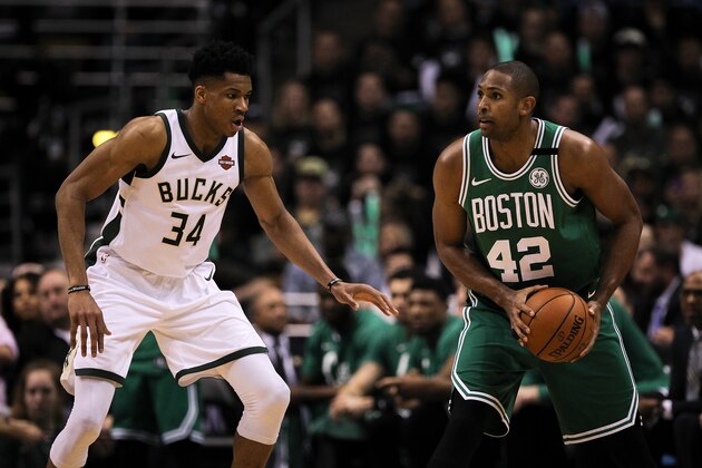 MILWAUKEE, WI - APRIL 26:  Al Horford #42 of the Boston Celtics handles the ball while being guarded by Giannis Antetokounmpo #34 of the Milwaukee Bucks in the third quarter during Game Six of Round One of the 2018 NBA Playoffs at the Bradley Center on April 26, 2018 in Milwaukee, Wisconsin. NOTE TO USER: User expressly acknowledges and agrees that, by downloading and or using this photograph, User is consenting to the terms and conditions of the Getty Images License Agreement. (Photo by Dylan Buell/Getty Images) *** Local Caption *** Al Horford;Giannis Antetokounmpo