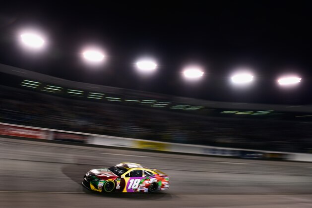 RICHMOND, VA - APRIL 21:  Kyle Busch, driver of the #18 M&M's Flavor Vote Toyota, races during the Monster Energy NASCAR Cup Series Toyota Owners 400 at Richmond Raceway on April 21, 2018 in Richmond, Virginia.  (Photo by Jared C. Tilton/Getty Images)