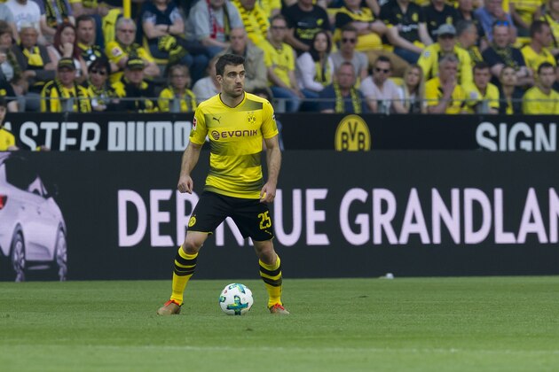 DORTMUND, GERMANY - APRIL 21: Sokratis Papastathopoulos of Dortmund controls the ball during the Bundesliga match between Borussia Dortmund and Bayer 04 Leverkusen at Signal Iduna Park on April 21, 2018 in Dortmund, Germany. (Photo by TF-Images/TF-Images via Getty Images)
