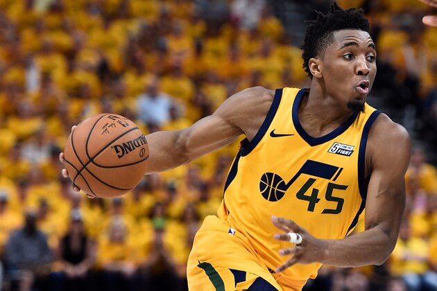SALT LAKE CITY, UT - APRIL 27: Donovan Mitchell #45 of the Utah Jazz drives with the ball during Game Six of Round One of the 2018 NBA Playoffs against the Oklahoma City Thunder at Vivint Smart Home Arena on April 27, 2018 in Salt Lake City, Utah.  NOTE TO USER: User expressly acknowledges and agrees that, by downloading and or using this photograph, User is consenting to the terms and conditions of the Getty Images License Agreement. (Photo by Gene Sweeney Jr./Getty Images)