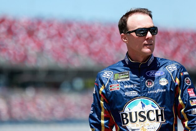 TALLADEGA, AL - APRIL 28:  Kevin Harvick, driver of the #4 Busch Beer Flannel Ford, stands on the grid during qualifying for the Monster Energy NASCAR Cup Series GEICO 500 at Talladega Superspeedway on April 28, 2018 in Talladega, Alabama.  (Photo by Sean Gardner/Getty Images)