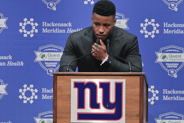 Running back Saquon Barkley answers questions during a news conference, Saturday, April 28, 2018, in East Rutherford, N.J. Barkley was selected as the number two overall pick in the NFL football draft by the New York Giants. (AP Photo/Julie Jacobson)