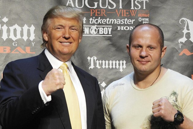 US real estate mogul Donald Trump (C) poses with Mixed Martial Art (MMA) heavyweight fighters US Josh Barnett (L) and Russia's Fedor Emelianenko in New York on June 03, 2009 during a press conference to introduce a World MMA Championship which will take place between the two fighters. The upcoming fight is scheduled to take place on August, 1, 2009 in Anaheim, California.       AFP PHOTO/Emmanuel Dunand (Photo credit should read EMMANUEL DUNAND/AFP/Getty Images)