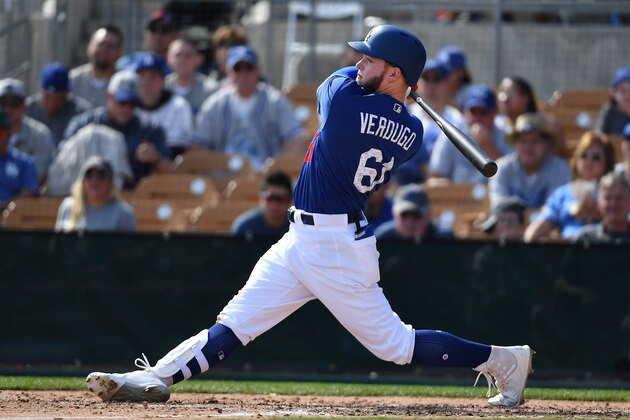 GLENDALE, AZ - MARCH 01:  Alex Verdugo #61 of the Los Angeles Dodgers singles in the spring training game against the Cleveland Indians at Camelback Ranch on March 1, 2018 in Glendale, Arizona.  (Photo by Jennifer Stewart/Getty Images)