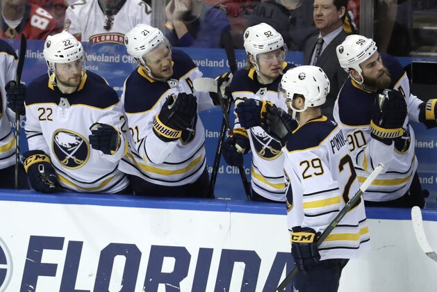 Buffalo Sabres' Jason Pominville (29) is congratulated by Johan Larsson (22) and Kyle Okposo (21) after scoring a goal during the third period of an NHL hockey game against the Florida Panthers, Saturday, April 7, 2018, in Sunrise, Fla. The Panthers won 4-3. (AP Photo/Lynne Sladky) Buffalo Sabres' Jason Pominville (29) is congratulated by Johan Larsson (22) and Kyle Okposo (21) after scoring a goal during the third period of an NHL hockey game against the Florida Panthers, Saturday, April 7, 2018, in Sunrise, Fla. The Panthers won 4-3. (AP Photo/Lynne Sladky)