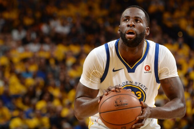 OAKLAND, CA - APRIL 28: Draymond Green #23 of the Golden State Warriors shoots a free throw during the game against the New Orleans Pelicans in Game One of Round Two of the 2018 NBA Playoffs on April 28, 2018 at ORACLE Arena in Oakland, California. NOTE TO USER: User expressly acknowledges and agrees that, by downloading and or using this photograph, user is consenting to the terms and conditions of Getty Images License Agreement. Mandatory Copyright Notice: Copyright 2018 NBAE (Photo by Noah Graham/NBAE via Getty Images)