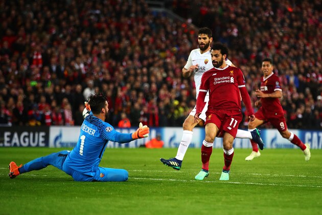 LIVERPOOL, ENGLAND - APRIL 24: Mohamed Salah of Liverpool scores his side's second goal during the UEFA Champions League Semi Final First Leg match between Liverpool and A.S. Roma at Anfield on April 24, 2018 in Liverpool, United Kingdom. (Photo by Chris Brunskill Ltd/Getty Images)