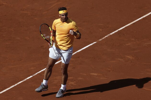 Spain's Rafael Nadal reacts after scoring a point against Greece's Stefanos Tsitsipas during the Barcelona Open Tennis Tournament final in Barcelona, Spain, Sunday, April 29, 2018. (AP Photo/Manu Fernandez)