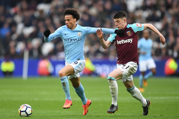 LONDON, ENGLAND - APRIL 29: Leroy Sane of Manchester City is challenged by Declan Rice of West Ham United during the Premier League match between West Ham United and Manchester City at London Stadium on April 29, 2018 in London, England. (Photo by Michael Regan/Getty Images) LONDON, ENGLAND - APRIL 29: Leroy Sane of Manchester City is challenged by Declan Rice of West Ham United during the Premier League match between West Ham United and Manchester City at London Stadium on April 29, 2018 in London, England. (Photo by Michael Regan/Getty Images)