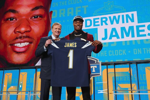 ARLINGTON, TX - APRIL 26:  Derwin James of FSU poses with NFL Commissioner Roger Goodell after being picked #17 overall by the Los Angeles Chargers during the first round of the 2018 NFL Draft at AT&T Stadium on April 26, 2018 in Arlington, Texas.  (Photo by Tom Pennington/Getty Images)
