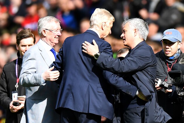 Arsenal's French manager Arsene Wenger (C) is greeted by Manchester United's former manager Alex Ferguson (L) and Manchester United's Portuguese manager Jose Mourinho (R) during a presentation before the English Premier League football match between Manchester United and Arsenal at Old Trafford in Manchester, north west England, on April 29, 2018. - Arsene Wenger is unsure of the welcome he will receive on his final visit to Old Trafford as Arsenal boss on Sunday after many 'great battles' against Manchester United during his two decades in charge. (Photo by Paul ELLIS / AFP) / RESTRICTED TO EDITORIAL USE. No use with unauthorized audio, video, data, fixture lists, club/league logos or 'live' services. Online in-match use limited to 75 images, no video emulation. No use in betting, games or single club/league/player publications. /         (Photo credit should read PAUL ELLIS/AFP/Getty Images)