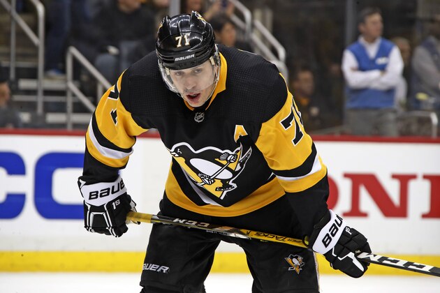 Pittsburgh Penguins' Evgeni Malkin waits for a face-off during the second period in Game 5 of an NHL first-round hockey playoff series against the Philadelphia Flyers in Pittsburgh, Friday, April 20, 2018. (AP Photo/Gene J. Puskar)