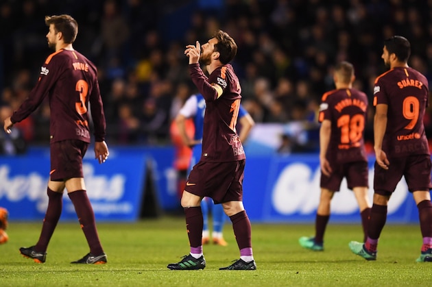 LA CORUNA, SPAIN - APRIL 29:  Lionel Messi of Barcelona (C) celebrates as he scores his sides third goal during the La Liga match between Deportivo La Coruna and Barcelona at Estadio Riazor on April 29, 2018 in La Coruna, Spain.  (Photo by David Ramos/Getty Images)