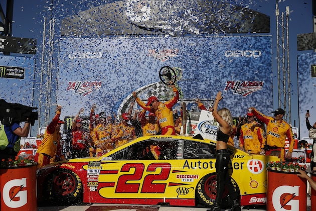 NASCAR driver Joey Logano celebrates in victory lane after winning the NASCAR Talladega auto race at Talladega Superspeedway, Sunday, April 29, 2018, in Talladega, Ala. (AP Photo/Brynn Anderson)