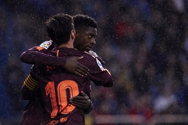 LA CORUNA, SPAIN - APRIL 29:  Lionel Messi of FC Barcelona celebrates with his team-mates after scoring his team's second goal during the La Liga match between Deportivo La Coruna and Barcelona at Abanca Riazor Stadium on April 29, 2018 in La Coruna, Spain.  (Photo by Quality Sport Images/Getty Images)