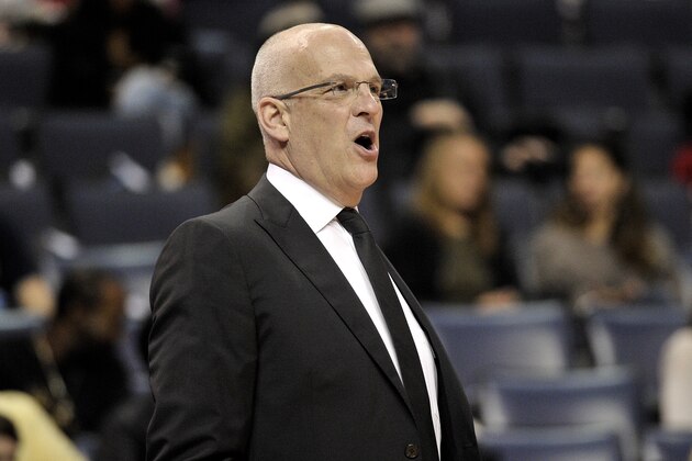 Phoenix Suns head coach Jay Triano calls to players in the first half of an NBA basketball game against the Memphis Grizzlies Wednesday, Feb. 28, 2018, in Memphis, Tenn. (AP Photo/Brandon Dill)