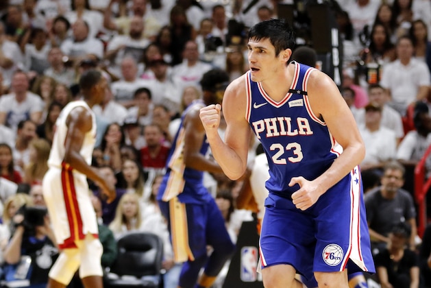 Philadelphia 76ers forward Ersan Ilyasova (23) reacts after his third-quarter score against the Miami Heat in Game 4 of a first-round NBA basketball playoff series, Saturday, April 21, 2018, in Miami. (AP Photo/Joe Skipper)