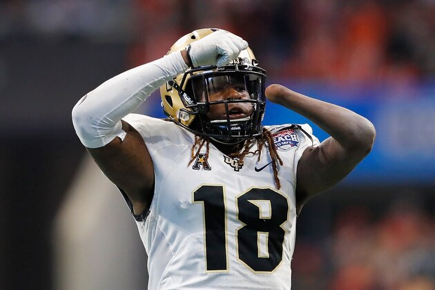 ATLANTA, GA - JANUARY 01:  Shaquem Griffin #18 of the UCF Knights celebrates after sacking Jarrett Stidham #8 of the Auburn Tigers (not pictured) in the third quarter during the Chick-fil-A Peach Bowl at Mercedes-Benz Stadium on January 1, 2018 in Atlanta, Georgia.  (Photo by Kevin C. Cox/Getty Images)