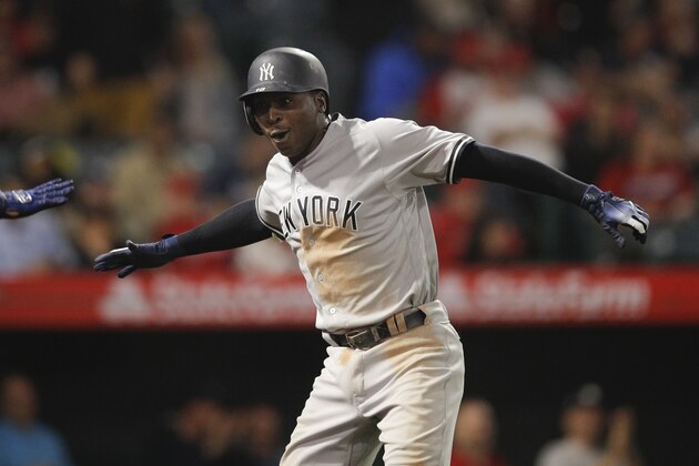 New York Yankees' Didi Gregorius celebrates his home run during the 10th inning of a baseball game against the Los Angeles Angels, Friday, April 27, 2018, in Anaheim, Calif. (AP Photo/Jae C. Hong)