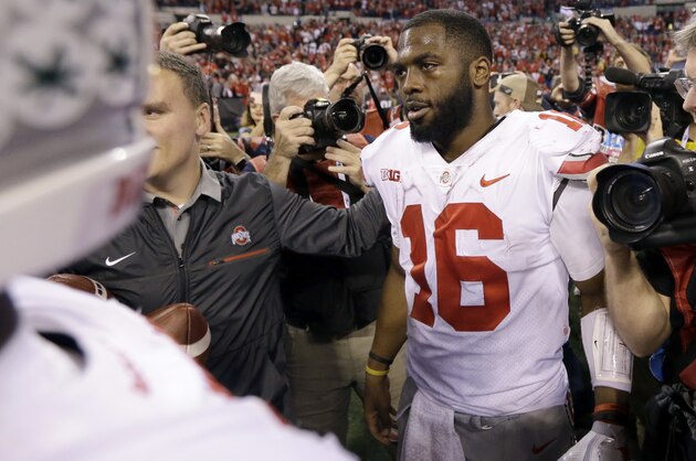 Ohio State quarterback J.T. Barrett celebrates after defeating Wisconsin in during the the Big Ten championship NCAA college football game, Sunday, Dec. 3, 2017, in Indianapolis. Ohio State won 27-21. (AP Photo/AJ Mast)