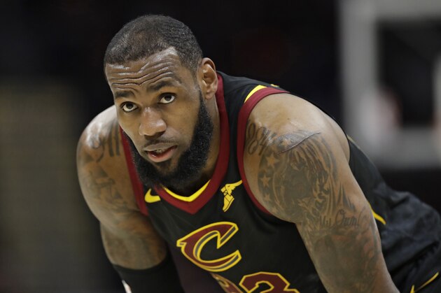 Cleveland Cavaliers' LeBron James waits for the game to resume in the first half of Game 5 of an NBA basketball first-round playoff series against the Indiana Pacers, Wednesday, April 25, 2018, in Cleveland. (AP Photo/Tony Dejak)